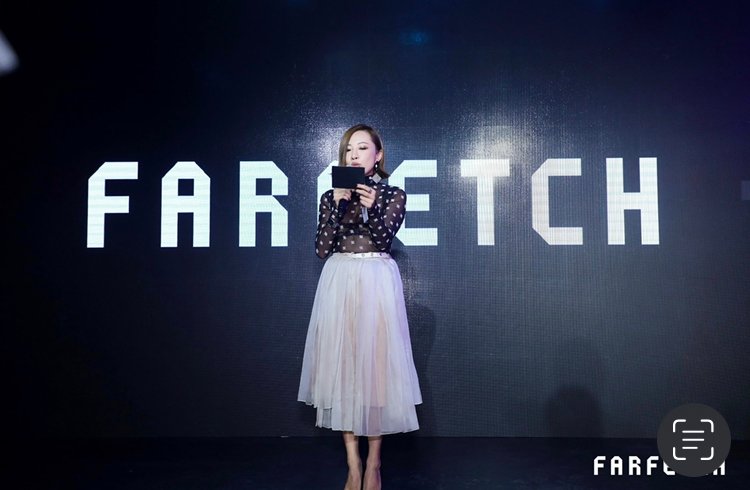 Founder Gogo Cheng delivers an opening speech at an exclusive Farfetch event